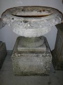 A large Garden urn on stand.