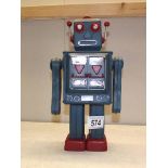 A tinplate model robot money box.