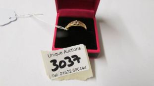 A 9ct yellow gold single stone diamond ring, size O.
