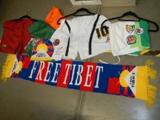 A mixed lot of football related items including shorts, scarf etc.