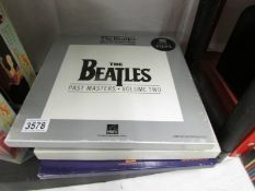 4 boxed CD sets, Sgt Pepper, The Beatles, Let It Be, Past Masters Vol 11.