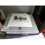 4 boxed CD sets, Sgt Pepper, The Beatles, Let It Be, Past Masters Vol 11.