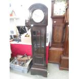 A mahogany Grandmother clock.