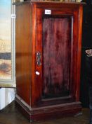 A mahogany pot cupboard.