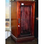 A mahogany pot cupboard.