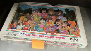 Two 1960's Beatles jigsaw puzzles with posters etc.