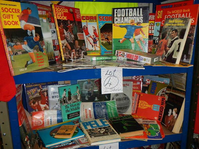 A very interesting lot of football memorabilia on 2 shelves, in excess of 40 books in total,