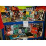 A very interesting lot of football memorabilia on 2 shelves, in excess of 40 books in total,