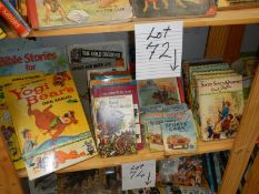 A shelf of books and annuals including Secret Seven, Yogi Bear, Railway and car books.