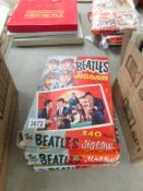 Four 1960's Beatles jigsaw puzzles.