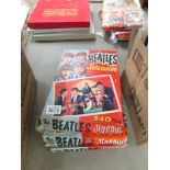 Four 1960's Beatles jigsaw puzzles.