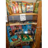 Five shelves of interesting annuals including Superman, The Saint, Fireball XL5, Dakatari,