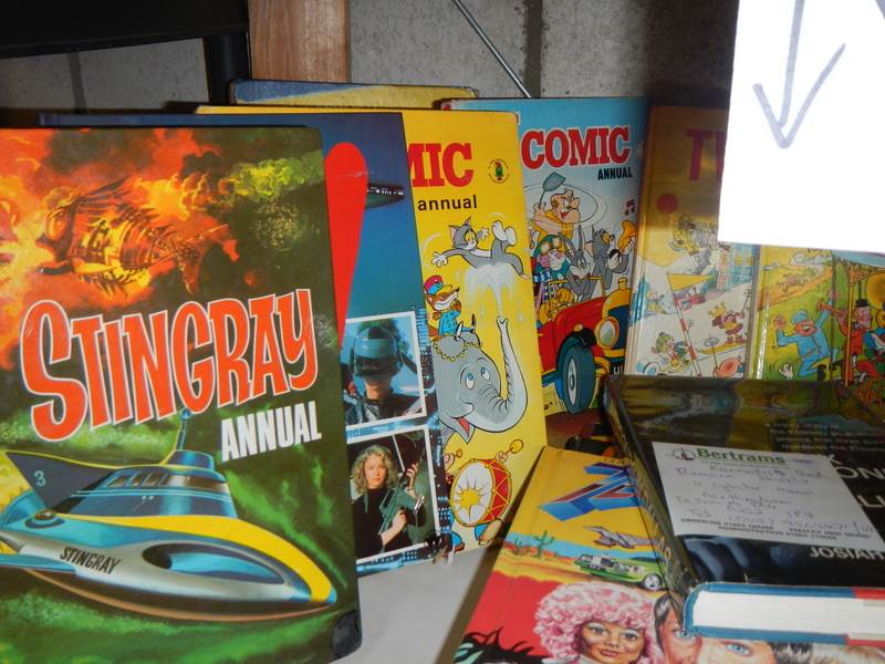 A shelf of assorted annuals including TV 21, TV Comic, Sting Ray etc. - Image 2 of 3