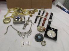 A mixed lot of jewellery and watches etc.