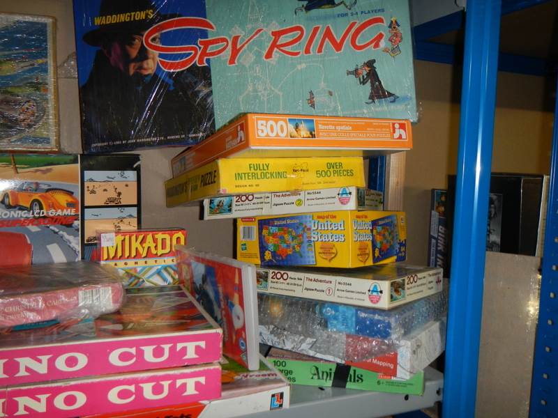 A large shelf of puzzles and games. - Image 3 of 3