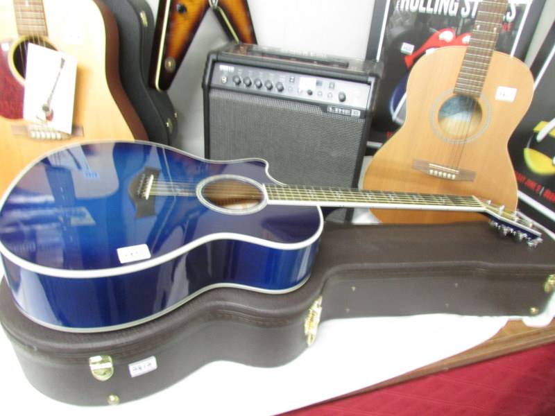 A Taylor 614CE electro acoustic guitar (V class bracing) with hard case.