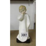 A Royal Doulton figurine DARLING hn1319, Hand written back stamp (hairline crack to base).