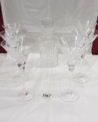 A crystal decanter and 6 cocktail glasses.