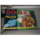 A Chad Valley 'Daktari' give-a-show projector,