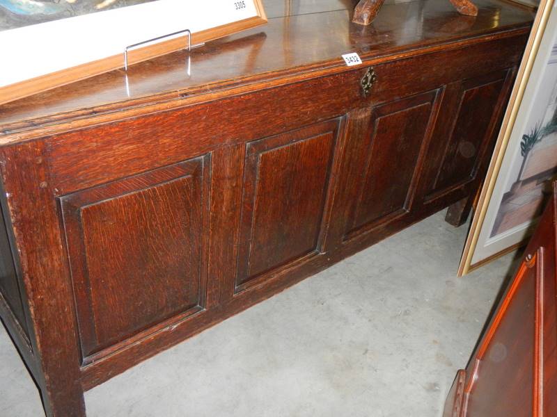 A period oak linen box.