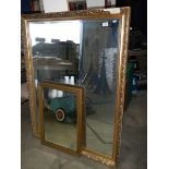A large gilt framed mirror and one other.