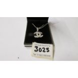 A silver and CZ 'Chanel' pendant necklace.
