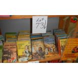 A shelf of assorted Ladybird books including catalogue.