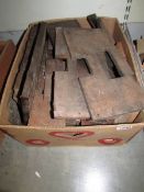 A box of longcase clock movement seat boards .