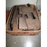 A box of longcase clock movement seat boards .