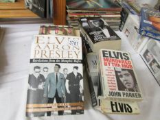 A quantity of Elvis hardback and paperback books.