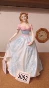 A Royal Doulton figurine 'Faith' HN4151 1999, (sold in supper of breast cancer charities).