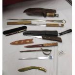 A mixed lot of letter openers, knives etc.