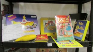 A mixed lot of Beatles Yellow Submarine items including Yellow Submarine early US comic, books,