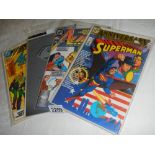 A quantity of anniversary DC comics in excellent condition & 2 Superman comics