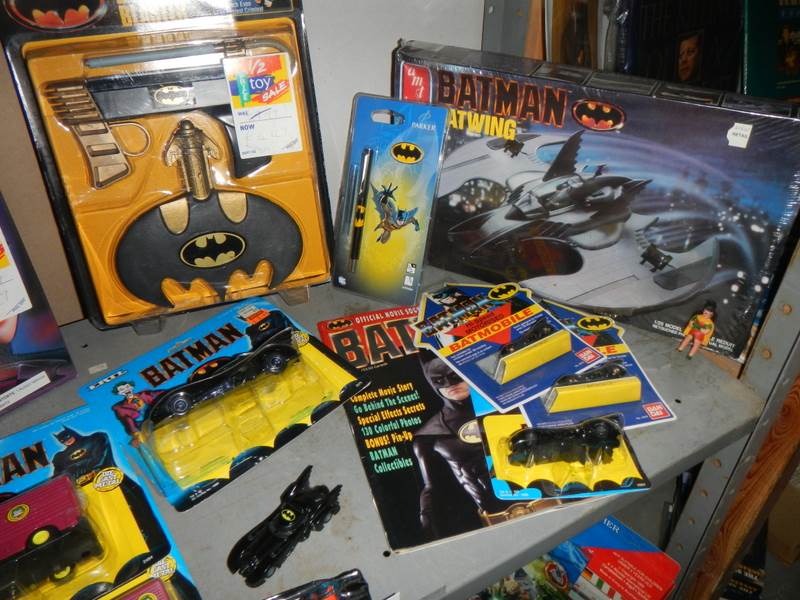A shelf of assorted Batman toys including Batjet etc. - Image 2 of 3