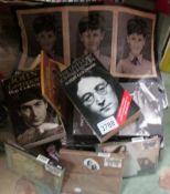 A quantity of John Lennon books and CD's.