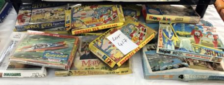 A quantity of vintage jigsaws including Supercar, Fireball XL-5 & Space 1999 etc.