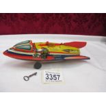 A HWN Rocket Mechanical Bank with key - tinplate West Germany - firing mechanism functions well