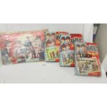 4 Beatles jigsaw puzzles including one completed.