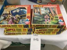 6 vintage UFO jigsaws,