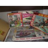 A quantity of 1960's jigsaw puzzles including UFO, James Bond, Dangerman etc.