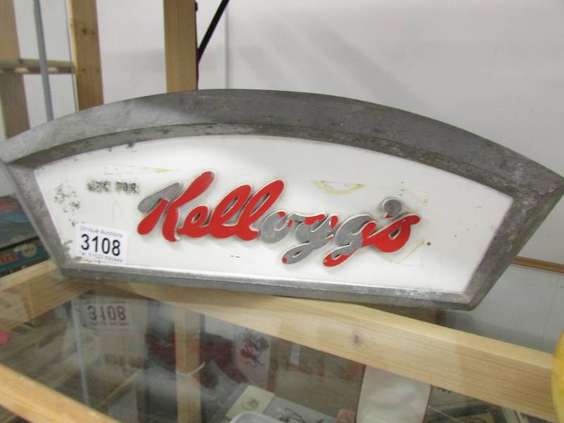 An aluminium Kellogg's shop display cabinet advertising sign.