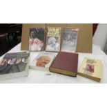 2 videos and 4 books relating to Mahatma Gandhi.