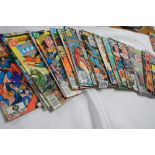 A quantity of Justice League America comics