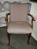 A Queen Anne leg office chair.