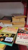 A small lot of Beatles paperbacks, some early.