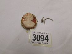 A Shell cameo brooch of female profile.