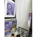 3 framed and glazed Jimi Hendrix pictures.
