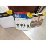 5 DeAgostinin Beatles LP records.