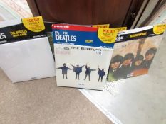 5 DeAgostinin Beatles LP records.